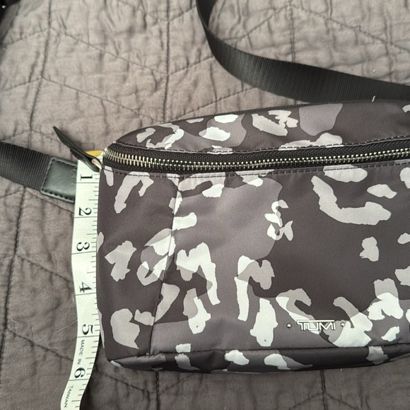 Tumi. New without tags. Endless pockets. - Picture 9 of 10